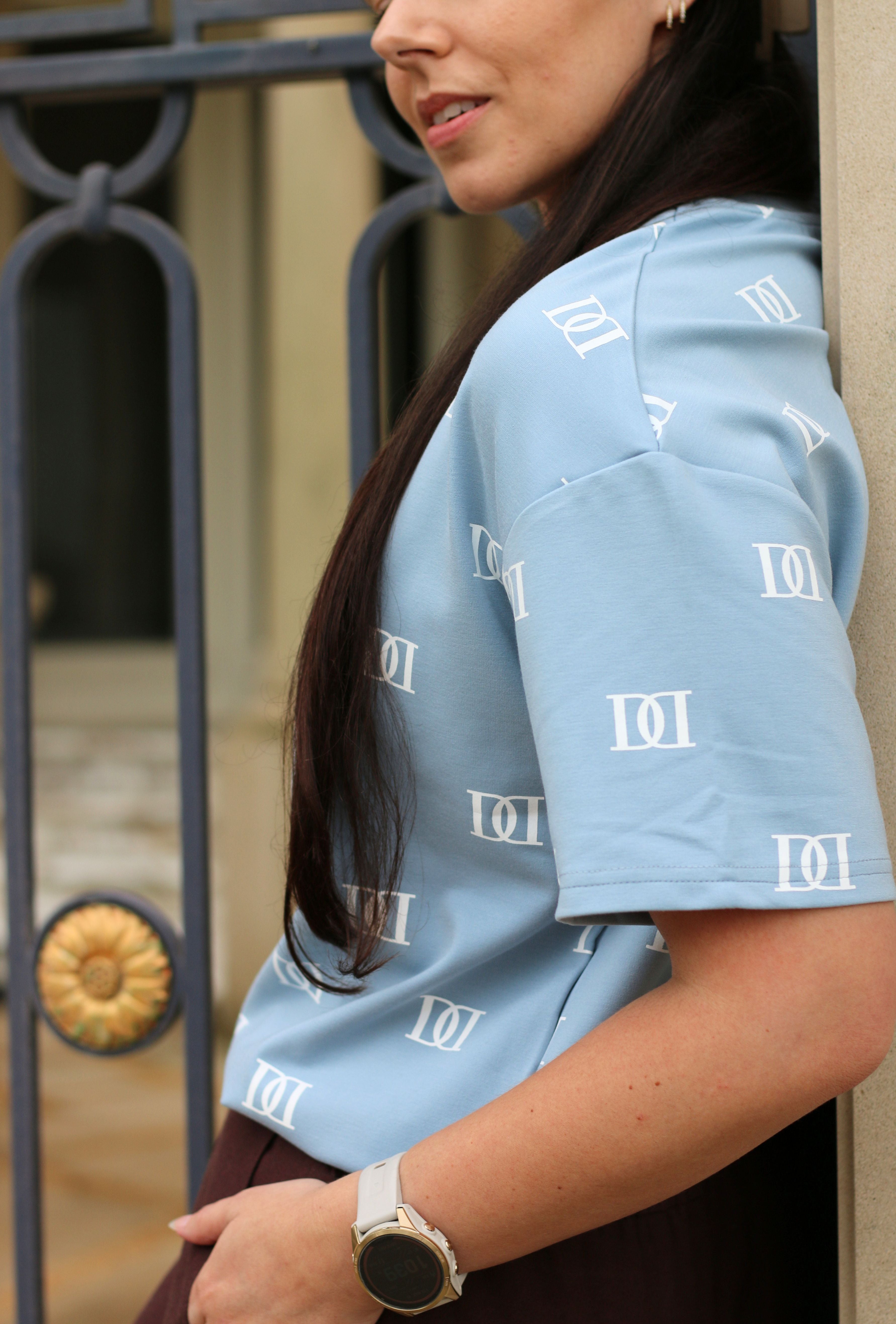 Blue oversized tee, cut specifically for shorter women.