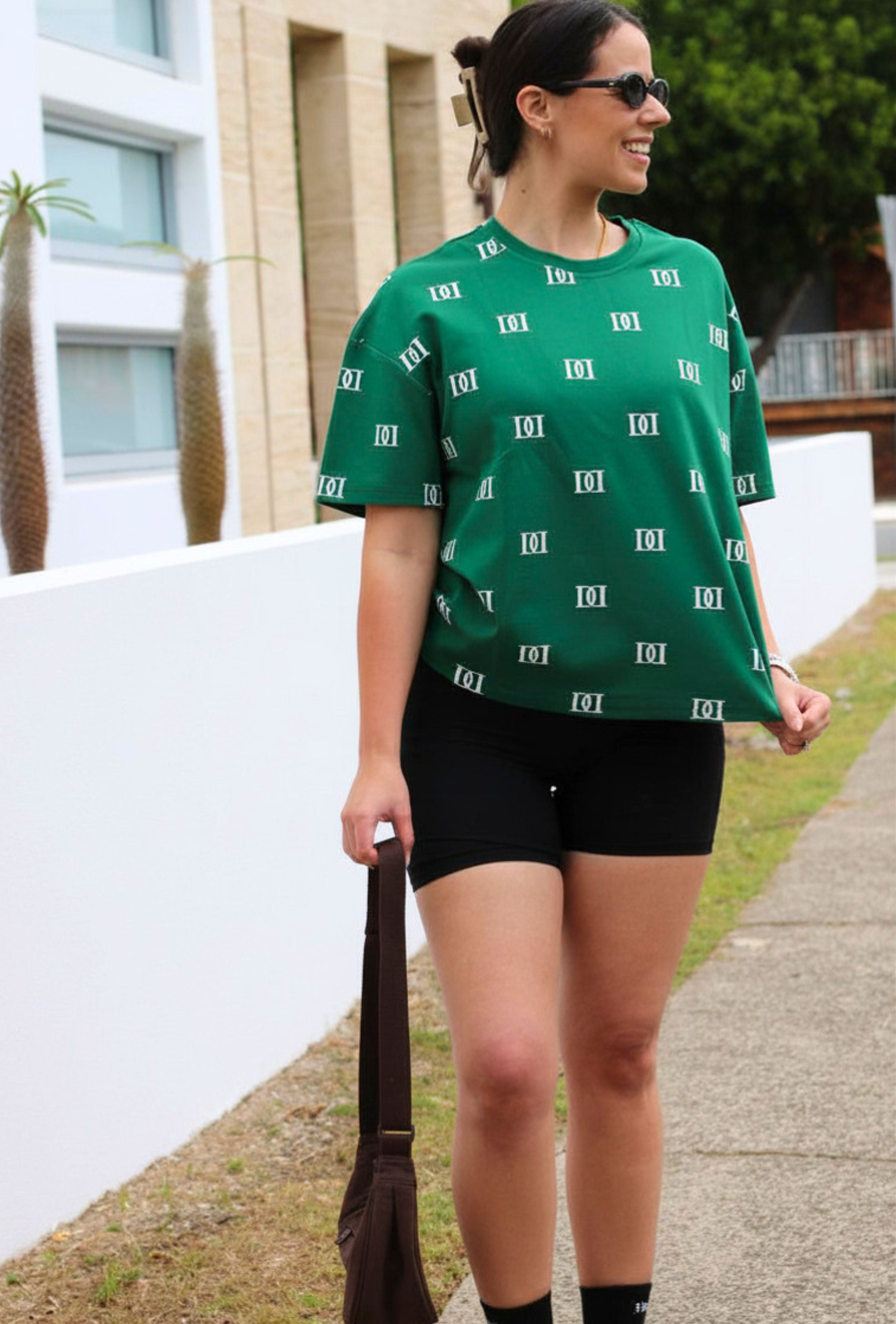 Green oversized tee, cut specifically for shorter women.