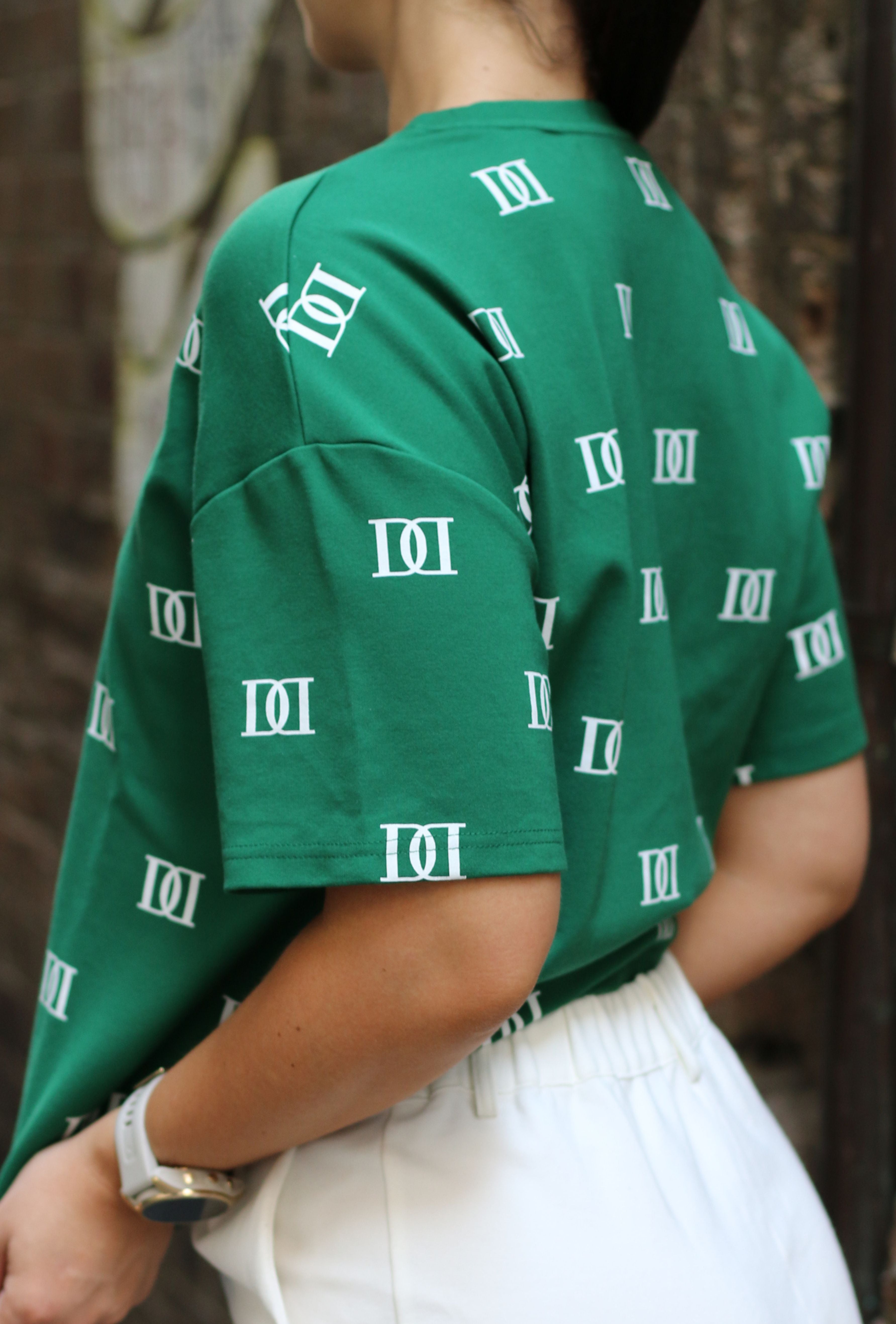 Green oversized tee, cut specifically for shorter women.