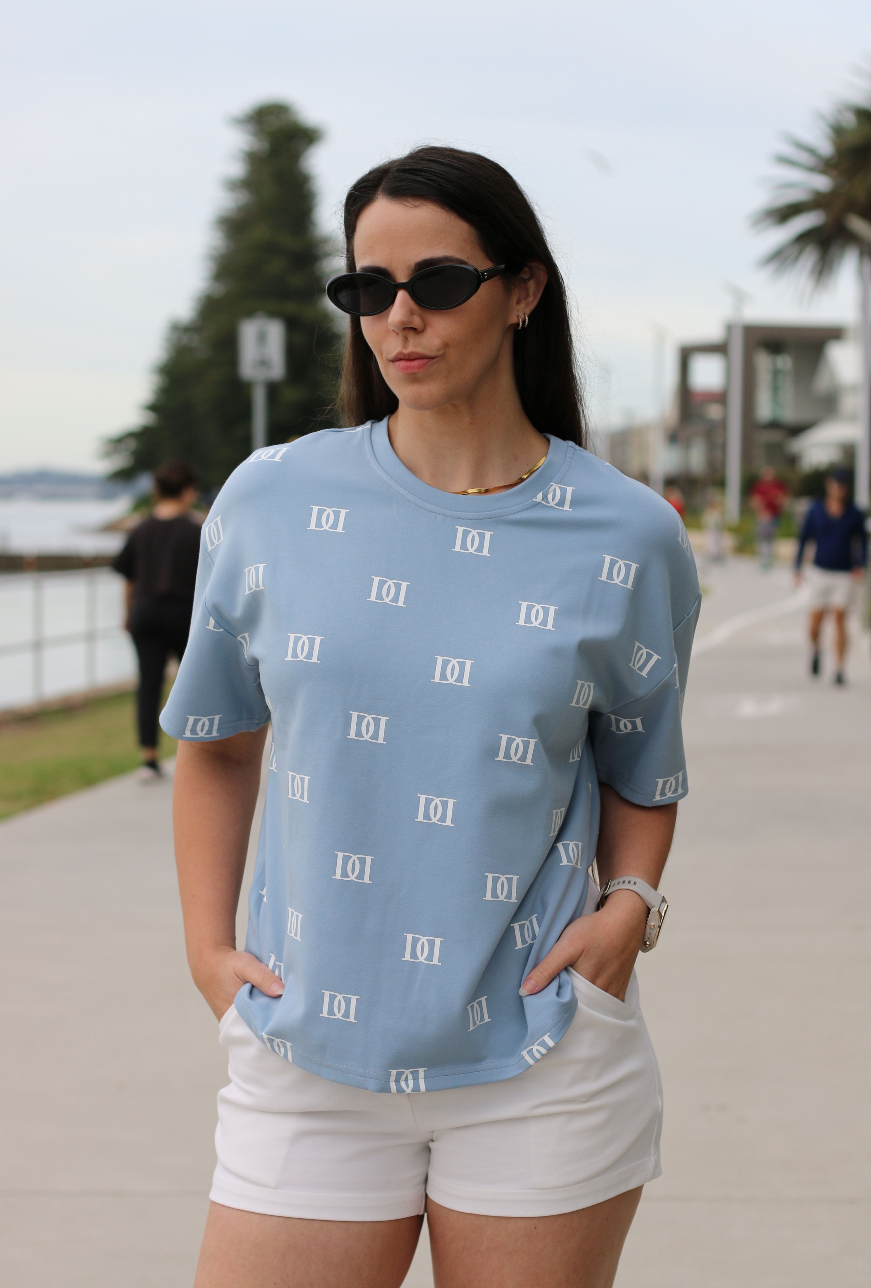 Blue oversized tee, cut specifically for shorter women.