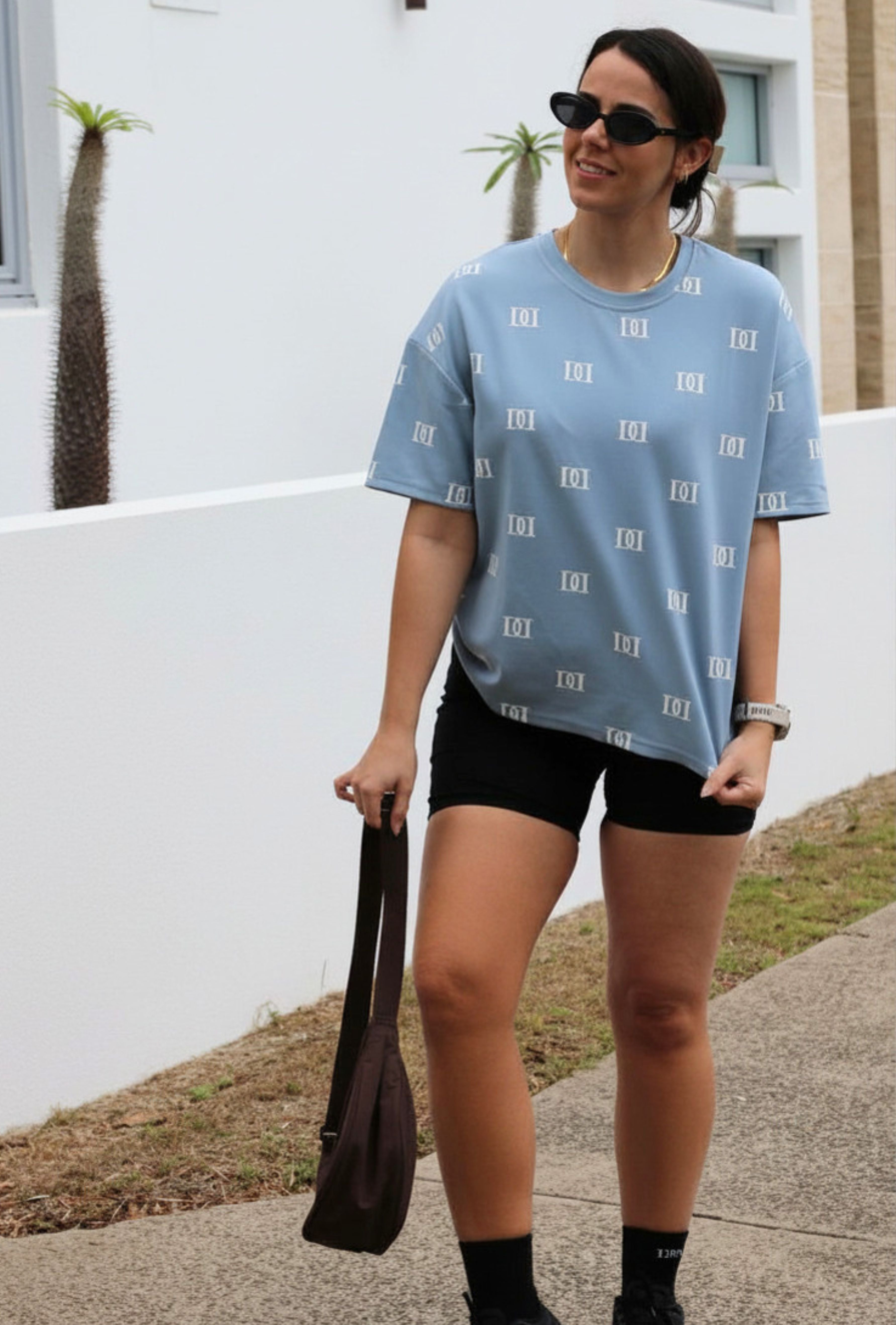 Blue oversized tee, cut specifically for shorter women.