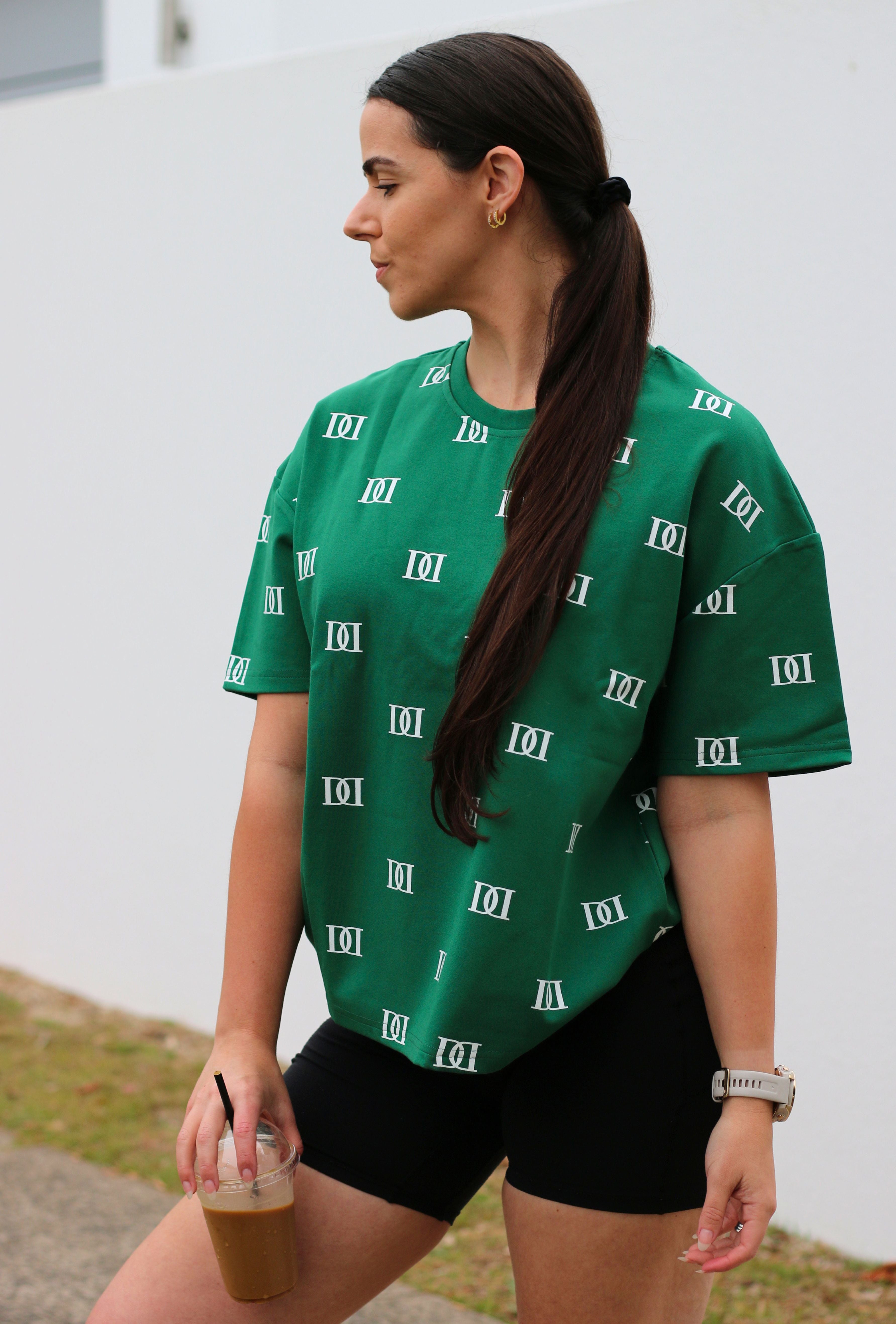Green oversized tee, cut specifically for shorter women.